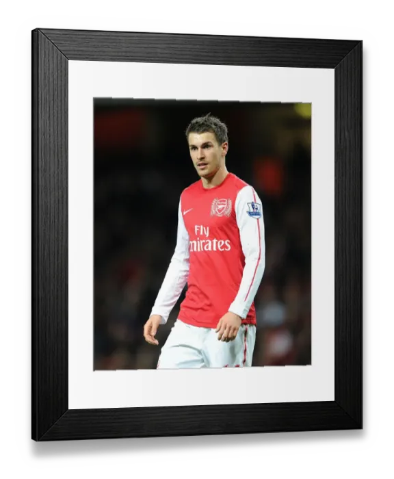 Framed Print : Aaron Ramsey's Star Performance: Arsenal vs Leeds United in FA Cup Showdown Framed Print : Aaron Ramsey's Star Performance: Arsenal vs Leeds United in FA Cup Showdown