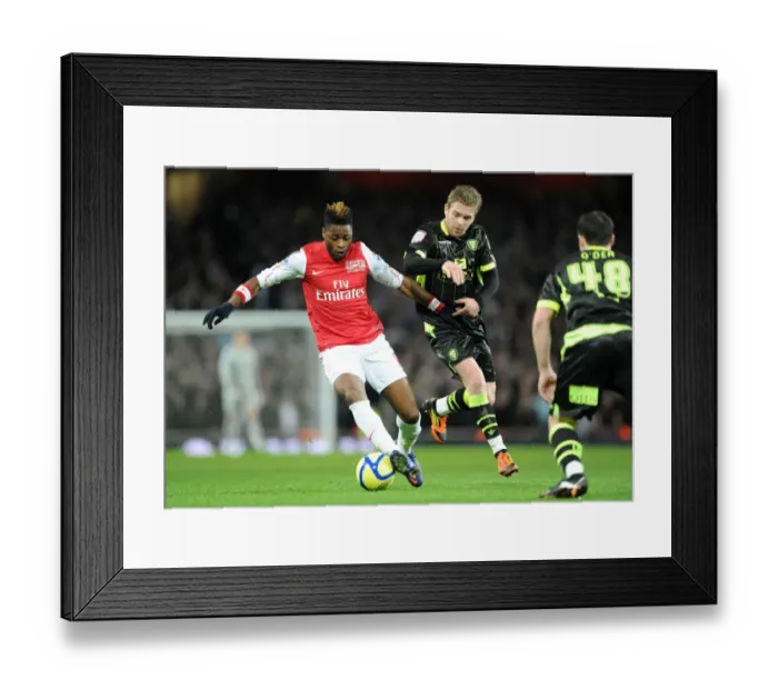Framed Print : Arsenal vs Leeds United: FA Cup Clash - Alex Song Holds Off Adam Clayton Framed Print : Arsenal vs Leeds United: FA Cup Clash - Alex Song Holds Off Adam Clayton