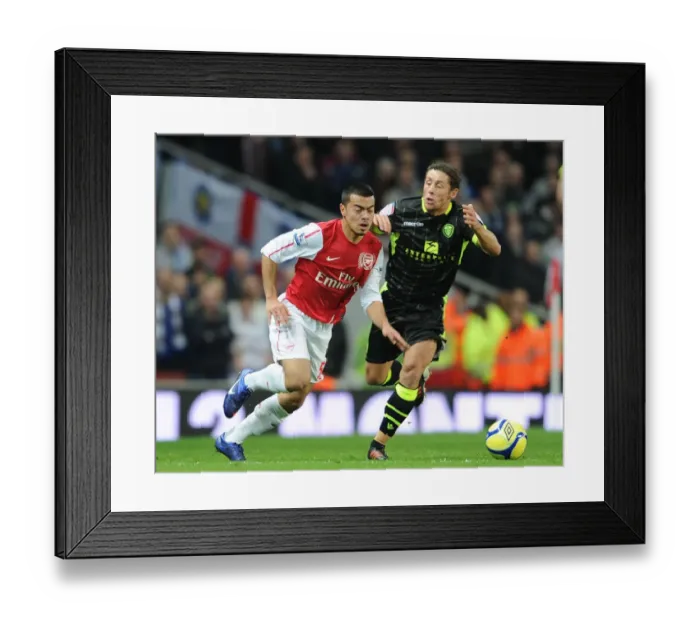 Framed Print : Arsenal vs Leeds United: Nico Yennaris vs Michael Brown - FA Cup Third Round Clash at Emirates Stadium, 2012 Framed Print : Arsenal vs Leeds United: Nico Yennaris vs Michael Brown - FA Cup Third Round Clash at Emirates Stadium, 2012
