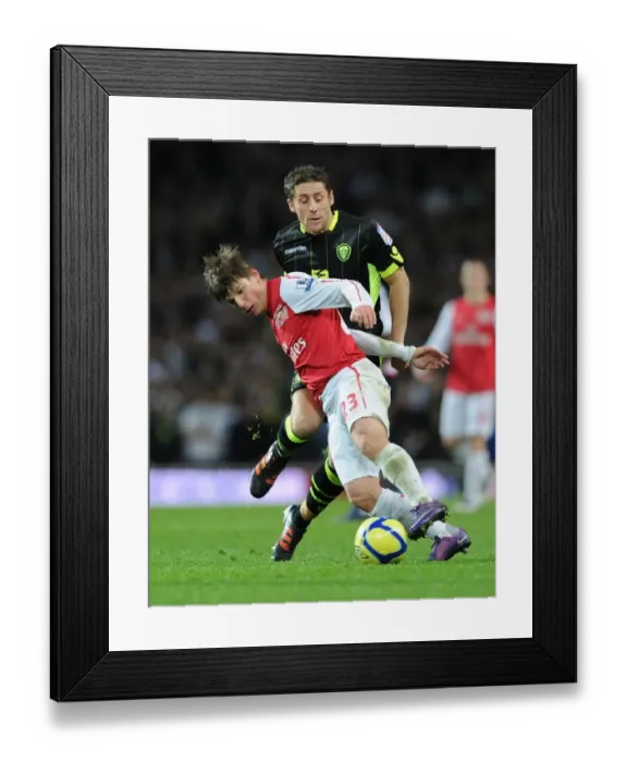 Framed Print : Arsenal's Andrey Arshavin Scores Past Leeds Michael Brown in FA Cup Clash Framed Print : Arsenal's Andrey Arshavin Scores Past Leeds Michael Brown in FA Cup Clash