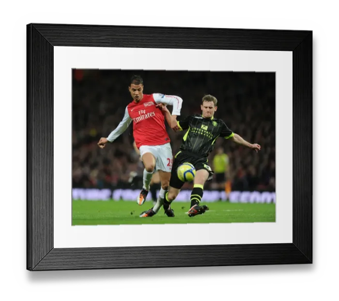 Framed Print : Arsenal's Marouane Chamakh Breaks Past Leeds Tom Lees in FA Cup Clash