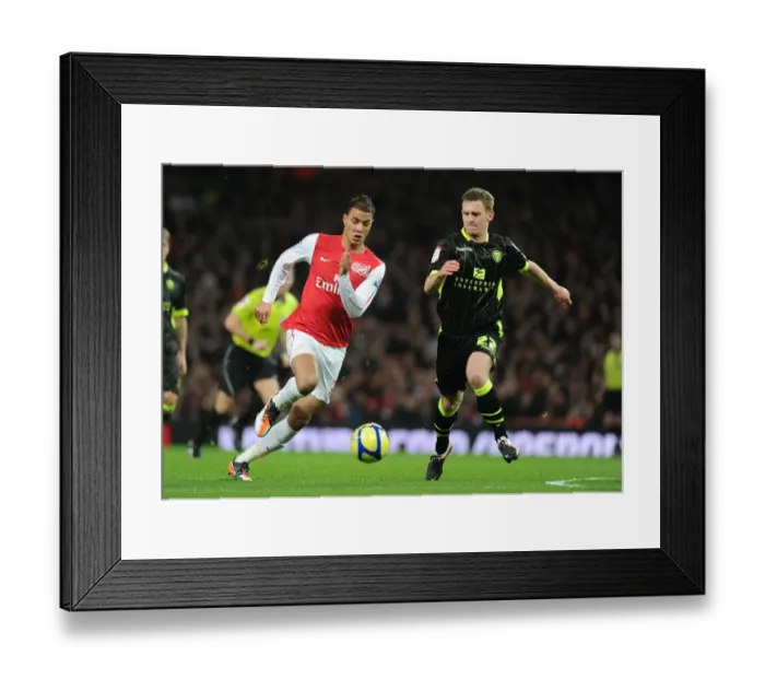 Framed Print : Arsenal vs Leeds United: Marouane Chamakh Clashes with Tom Lees in FA Cup Third Round Framed Print : Arsenal vs Leeds United: Marouane Chamakh Clashes with Tom Lees in FA Cup Third Round