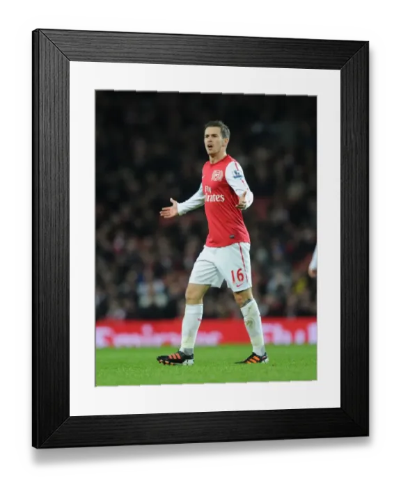 Framed Print : Arsenal's Aaron Ramsey in FA Cup Action Against Leeds United (2011-12) Framed Print : Arsenal's Aaron Ramsey in FA Cup Action Against Leeds United (2011-12)