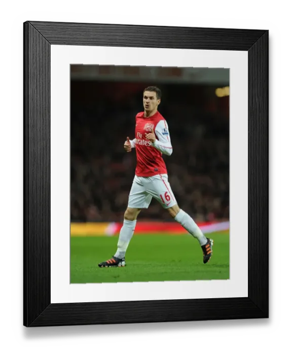 Framed Print : Arsenal's Aaron Ramsey Stars in FA Cup Showdown Against Leeds United Framed Print : Arsenal's Aaron Ramsey Stars in FA Cup Showdown Against Leeds United
