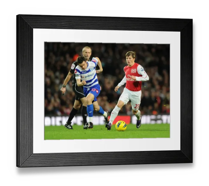 Framed Print : Arshavin Outmaneuvers Barton: Arsenal vs. Queens Park Rangers, Premier League, 2011