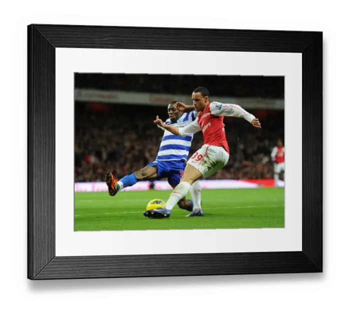 Framed Print : Arsenal's Coquelin Clashes with QPR's Wright-Phillips in Premier League Showdown
