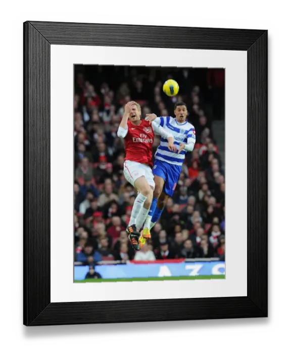 Framed Print : Per Mertesacker vs. Jay Bothroyd: Intense Clash Between Arsenal and Queens Park Rangers (2011-12) Framed Print : Per Mertesacker vs. Jay Bothroyd: Intense Clash Between Arsenal and Queens Park Rangers (2011-12)
