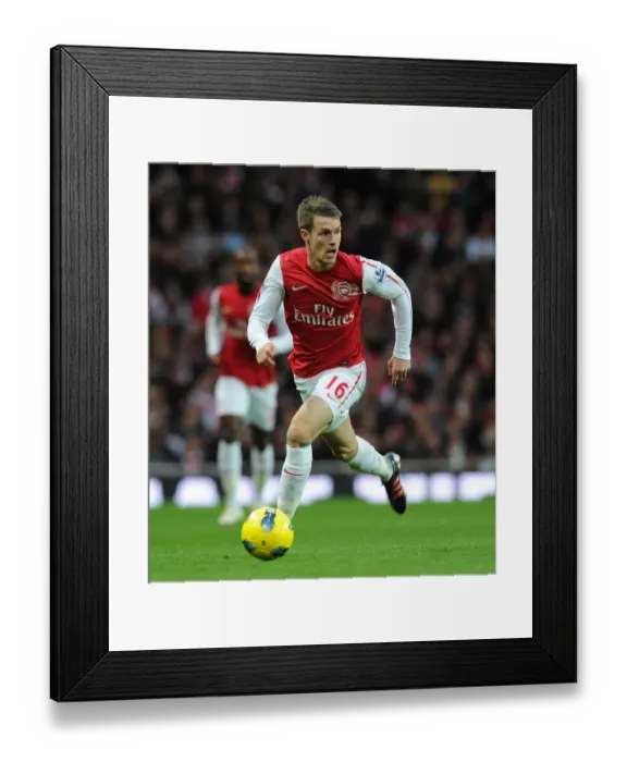Framed Print : Aaron Ramsey in Action: Arsenal vs. Queens Park Rangers (2011-12) Framed Print : Aaron Ramsey in Action: Arsenal vs. Queens Park Rangers (2011-12)