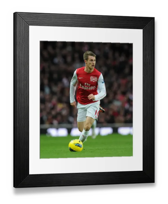Framed Print : Aaron Ramsey in Action: Arsenal vs. Queens Park Rangers (2011-12) Framed Print : Aaron Ramsey in Action: Arsenal vs. Queens Park Rangers (2011-12)