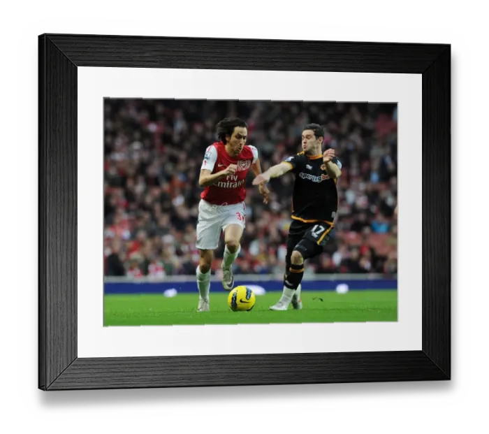 Framed Print : Arsenal's Yossi Benayoun Outmaneuvers Wolves Matt Jarvis during Premier League Clash