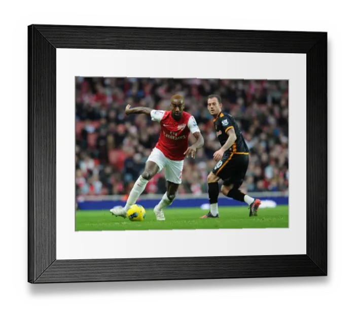 Framed Print : Arsenal's Johan Djourou Breaks Past Wolves Steven Fletcher during the 2011-2012 Premier League Clash Framed Print : Arsenal's Johan Djourou Breaks Past Wolves Steven Fletcher during the 2011-2012 Premier League Clash