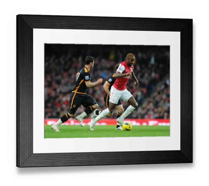 Framed Print : Arsenal's Johan Djourou Outruns Matt Jarvis in Arsenal vs. Wolverhampton Wanderers, Premier League 2011-2012 Framed Print : Arsenal's Johan Djourou Outruns Matt Jarvis in Arsenal vs. Wolverhampton Wanderers, Premier League 2011-2012