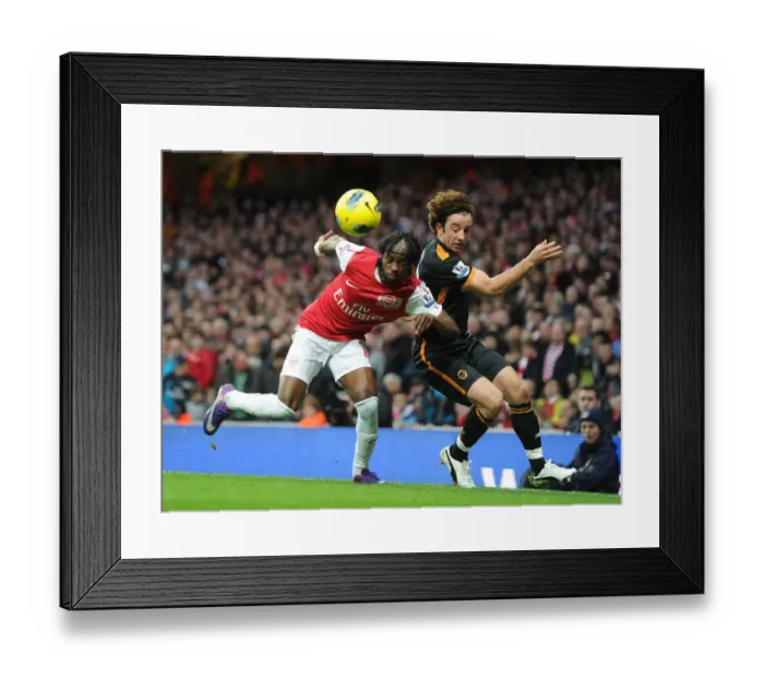 Framed Print : Gervinho vs. Hunt: A Premier League Battle at Emirates Stadium Framed Print : Gervinho vs. Hunt: A Premier League Battle at Emirates Stadium