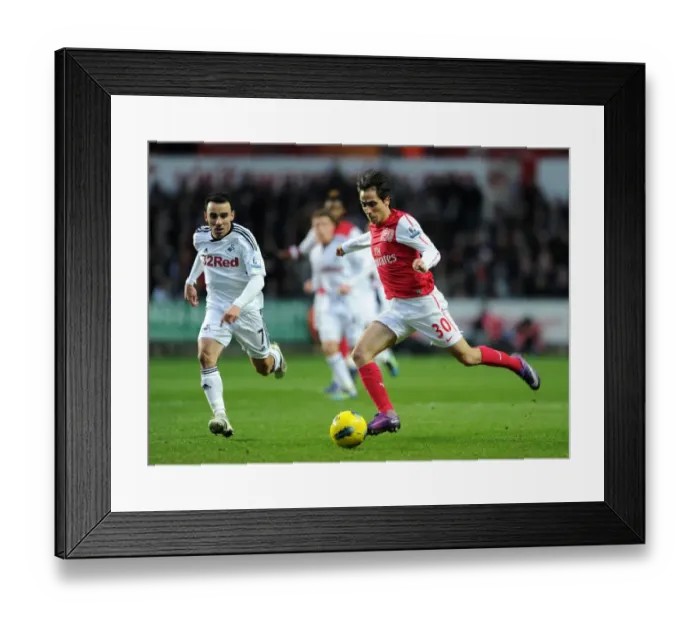 Framed Print : Yossi Benayoun (Arsenal) Leon Britton (Swansea). Swansea City 3: 2 Arsenal