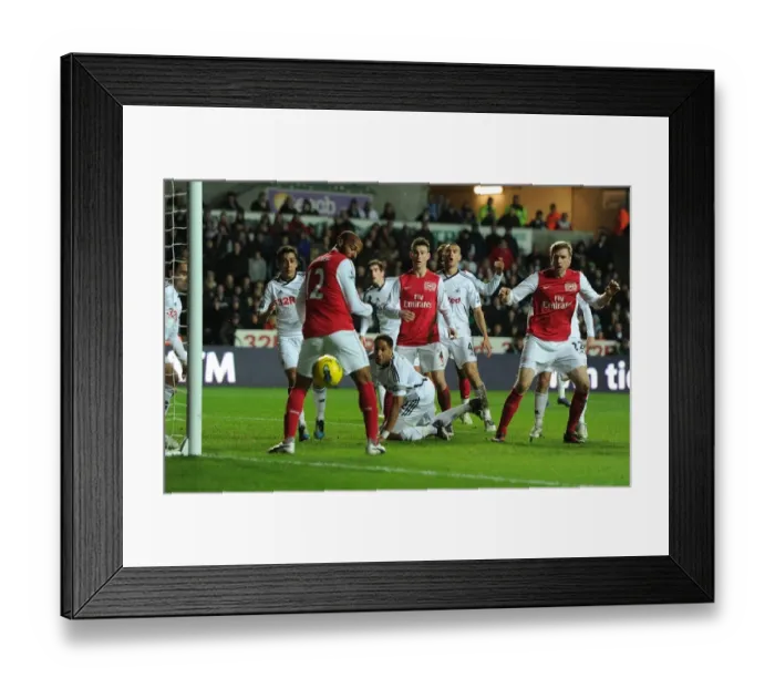 Framed Print : Per Mertesacker and Thierry Henry: A Moment from Swansea City vs. Arsenal, Premier League, 2012 Framed Print : Per Mertesacker and Thierry Henry: A Moment from Swansea City vs. Arsenal, Premier League, 2012