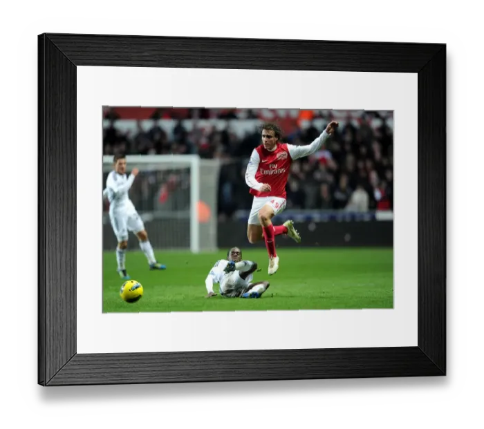 Framed Print : Miquel Leaps Past Dyer: Swansea vs. Arsenal, Premier League Clash (2011-12) Framed Print : Miquel Leaps Past Dyer: Swansea vs. Arsenal, Premier League Clash (2011-12)