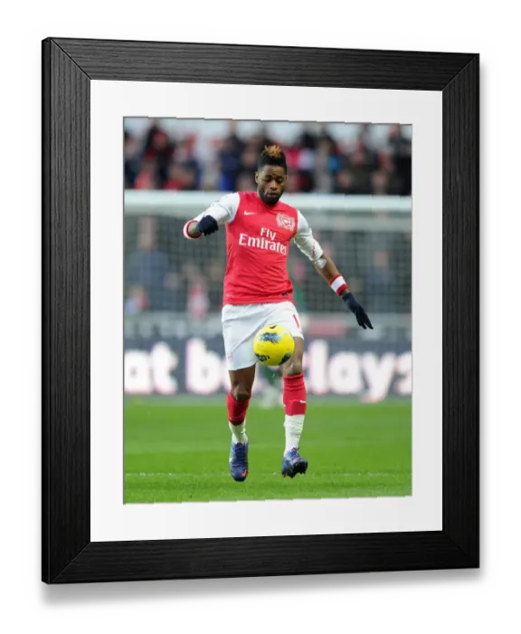 Framed Print : Alex Song (Arsenal). Swansea City 3: 2 Arsenal. Barclays Premier League Framed Print : Alex Song (Arsenal). Swansea City 3: 2 Arsenal. Barclays Premier League