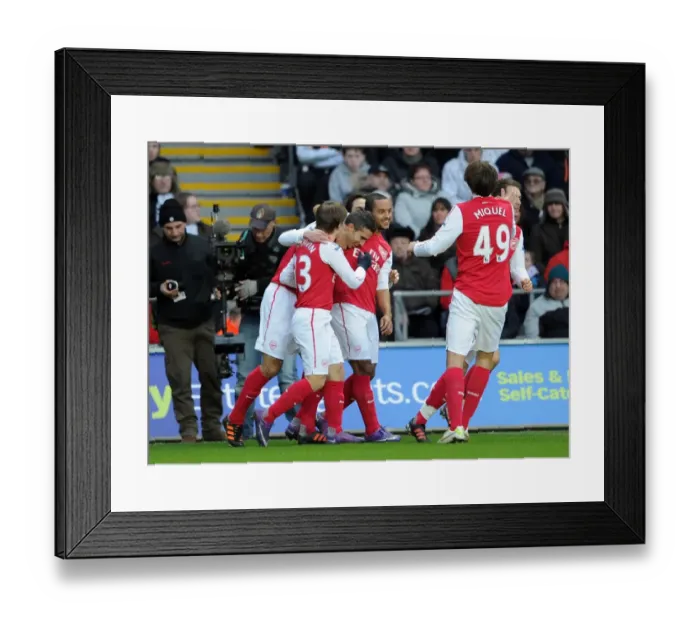 Framed Print : Robin van Persie's Goal Celebration: Swansea City vs. Arsenal (2011-12) Framed Print : Robin van Persie's Goal Celebration: Swansea City vs. Arsenal (2011-12)