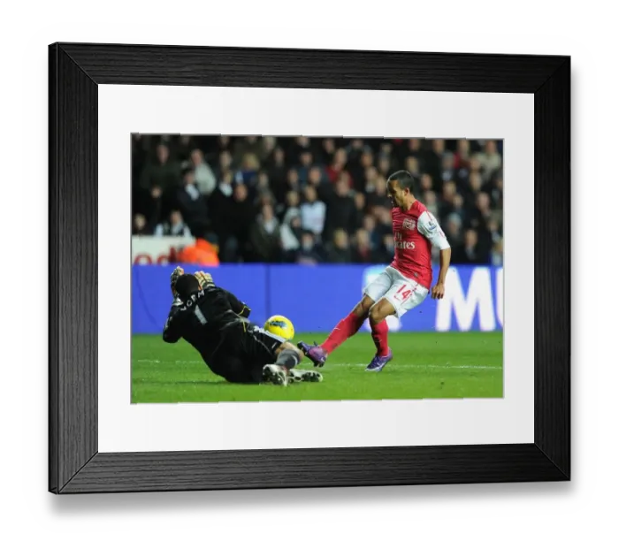 Framed Print : Theo Walcott Scores Past Michel Vorm: Swansea City vs. Arsenal, Premier League 2011-12 Framed Print : Theo Walcott Scores Past Michel Vorm: Swansea City vs. Arsenal, Premier League 2011-12
