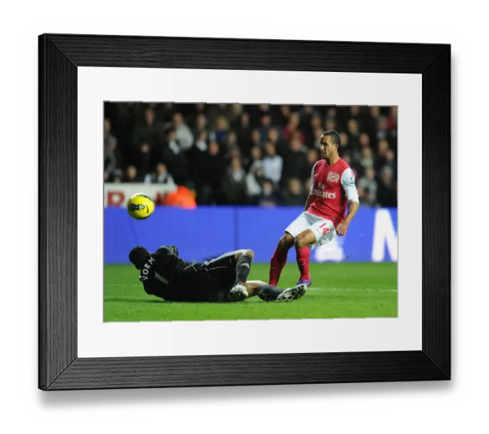 Framed Print : Theo Walcott's Stunning Goal Past Michel Vorm: A Memorable Moment for Arsenal vs Swansea City (2011-12)