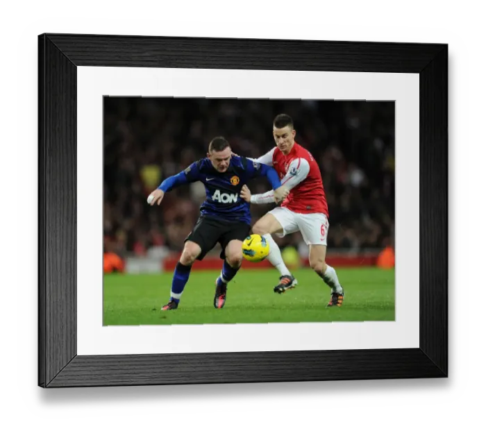Framed Print : Arsenal vs Manchester United: Koscielny Tackles Rooney in Intense Premier League Clash