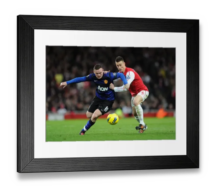 Framed Print : Intense Battle: Koscielny vs Rooney - Arsenal vs Manchester United (2011-12) Framed Print : Intense Battle: Koscielny vs Rooney - Arsenal vs Manchester United (2011-12)