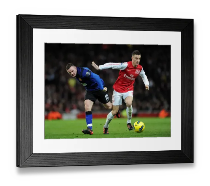 Framed Print : Intense Rivalry: Koscielny vs Rooney - Arsenal vs Manchester United (2011-12) Framed Print : Intense Rivalry: Koscielny vs Rooney - Arsenal vs Manchester United (2011-12)