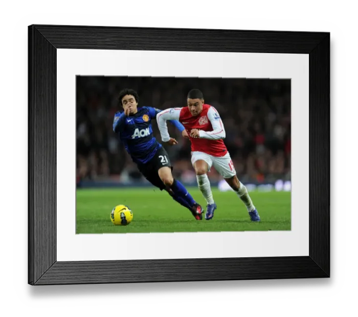Framed Print : Clash of Wings: Oxlade-Chamberlain vs. Rafael at the Emirates Framed Print : Clash of Wings: Oxlade-Chamberlain vs. Rafael at the Emirates