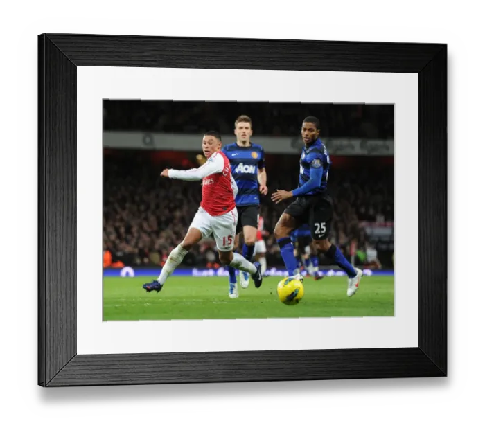 Framed Print : Intense Battle: Oxlade-Chamberlain vs Valencia - Arsenal vs Manchester United (2011-12) Framed Print : Intense Battle: Oxlade-Chamberlain vs Valencia - Arsenal vs Manchester United (2011-12)