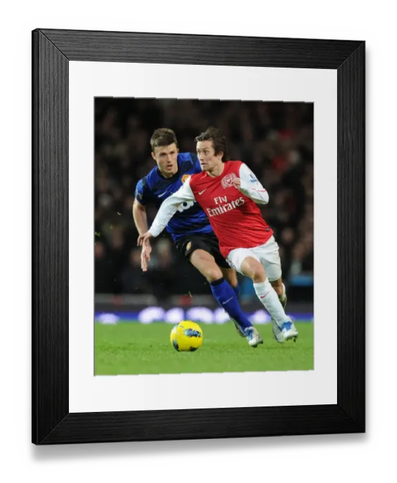 Framed Print : Arsenal's Tomas Rosicky Outmaneuvers Manchester United's Michael Carrick