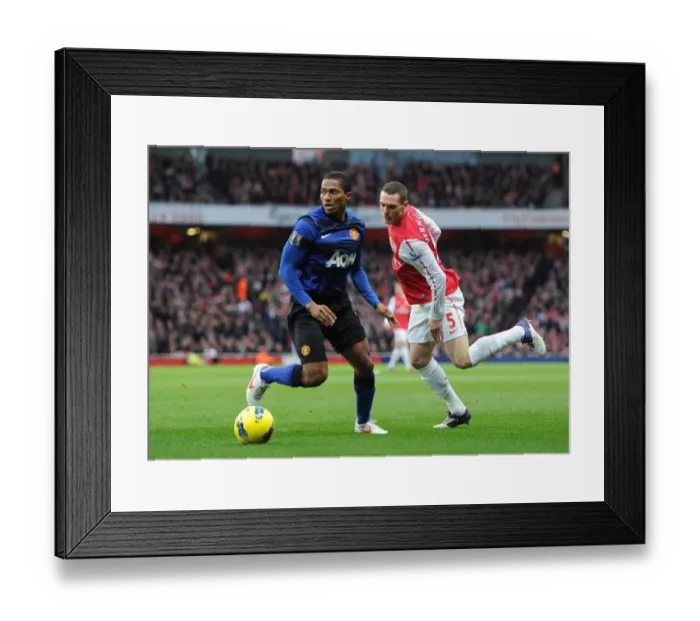 Framed Print : Thomas Vermaelen vs. Antonio Valencia: A Battle at the Emirates - Arsenal v Manchester United, Premier League 2011-12 Framed Print : Thomas Vermaelen vs. Antonio Valencia: A Battle at the Emirates - Arsenal v Manchester United, Premier League 2011-12