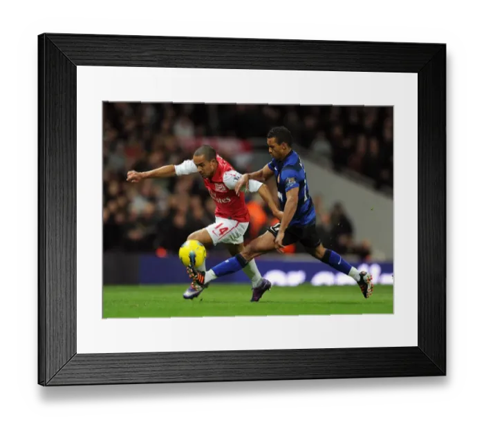 Framed Print : Theo Walcott vs Nani: Clash of Wings in Arsenal vs Manchester United (2011-12)