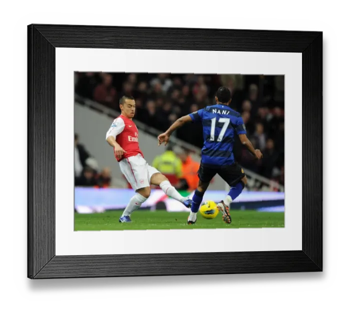 Framed Print : Nico Yennaris (Arsenal) Nani (Man Utd). Arsenal 1: 2 Manchester United. Barclays Premier League Framed Print : Nico Yennaris (Arsenal) Nani (Man Utd). Arsenal 1: 2 Manchester United. Barclays Premier League