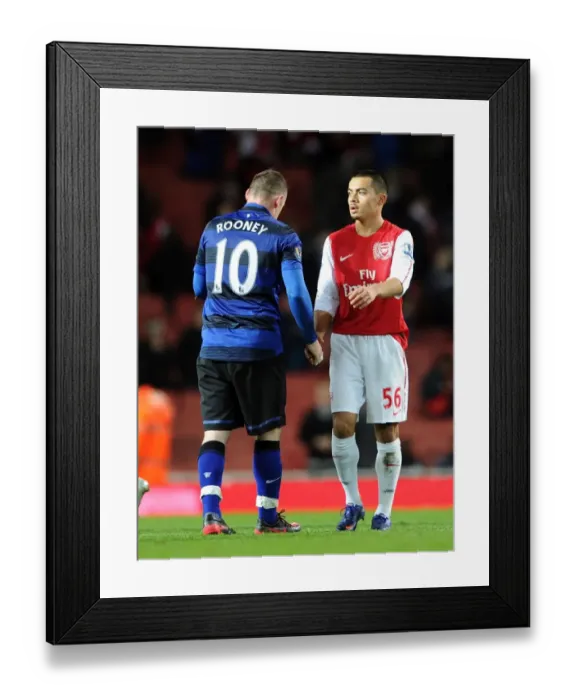 Framed Print : Nico Yennaris (Arsenal) shakes hands with Wayne Rooney (Man Utd) after the match