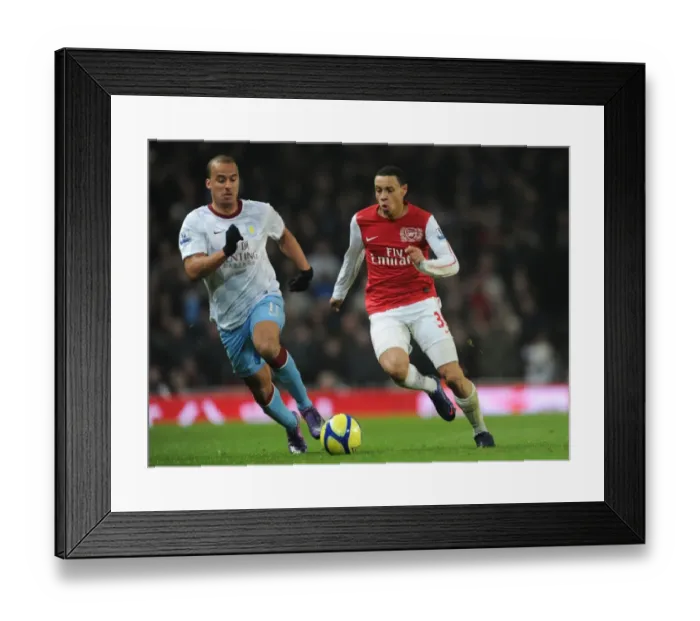 Framed Print : Arsenal's Coquelin Clashes with Villa's Agbonlahor in FA Cup Showdown Framed Print : Arsenal's Coquelin Clashes with Villa's Agbonlahor in FA Cup Showdown