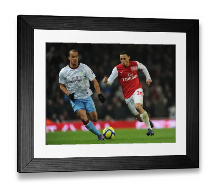 Framed Print : Coquelin vs. Agbonlahor: Intense Clash in Arsenal's FA Cup Battle Framed Print : Coquelin vs. Agbonlahor: Intense Clash in Arsenal's FA Cup Battle