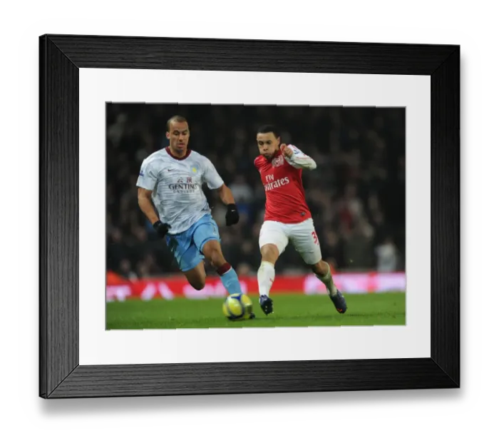 Framed Print : Arsenal's Coquelin Clashes with Agbonlahor in FA Cup Showdown Framed Print : Arsenal's Coquelin Clashes with Agbonlahor in FA Cup Showdown