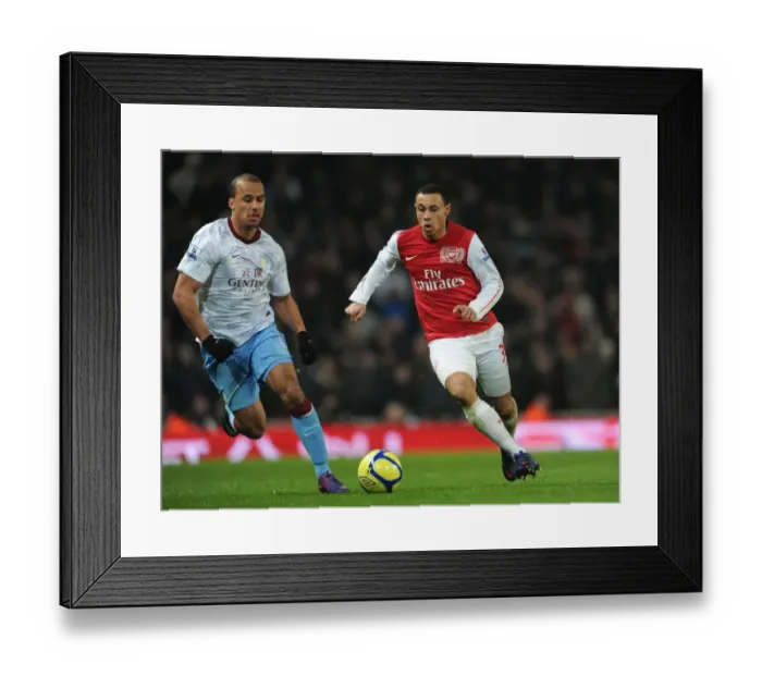 Framed Print : Coquelin vs. Agbonlahor: A Midfield Battle of Intensity in Arsenal's FA Cup Clash against Aston Villa