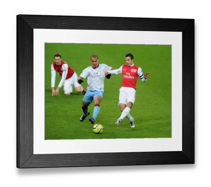 Framed Print : Arsenal's Robin van Persie Clashes with Aston Villa's Gabriel Agbonlahor in FA Cup Showdown Framed Print : Arsenal's Robin van Persie Clashes with Aston Villa's Gabriel Agbonlahor in FA Cup Showdown