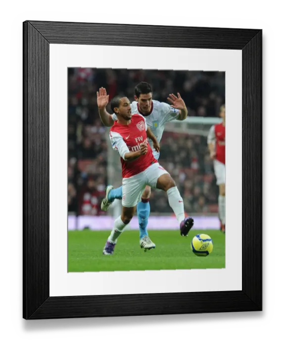 Framed Print : Theo Walcott Surges Past Ciaran Clark in FA Cup Fourth Round Clash: Arsenal vs. Aston Villa Framed Print : Theo Walcott Surges Past Ciaran Clark in FA Cup Fourth Round Clash: Arsenal vs. Aston Villa