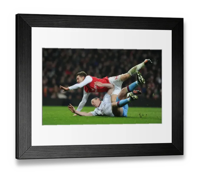 Framed Print : Arsenal vs Aston Villa: FA Cup Drama - Ramsey Penalty Decided by Dunne Foul