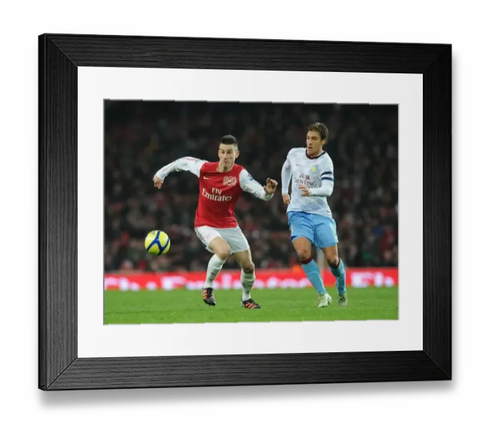 Framed Print : Arsenal's Koscielny Battles Past Petrov in FA Cup Showdown Framed Print : Arsenal's Koscielny Battles Past Petrov in FA Cup Showdown