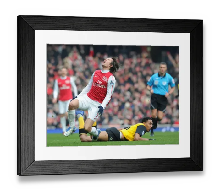 Framed Print : Arsenal vs. Blackburn Rovers: Rosicky Fouled by Nzonzi in 2011-12 Premier League Clash Framed Print : Arsenal vs. Blackburn Rovers: Rosicky Fouled by Nzonzi in 2011-12 Premier League Clash