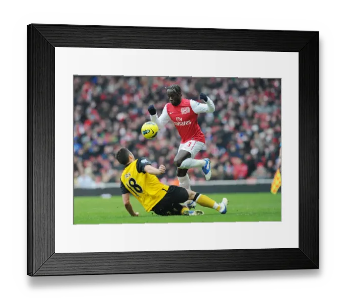 Framed Print : Arsenal vs. Blackburn Rovers: Sagna Soars Over Opponent in Premier League Clash (2011-12) Framed Print : Arsenal vs. Blackburn Rovers: Sagna Soars Over Opponent in Premier League Clash (2011-12)