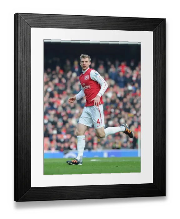 Framed Print : Arsenal's Per Mertesacker in Action against Blackburn Rovers, Premier League 2011-12 Framed Print : Arsenal's Per Mertesacker in Action against Blackburn Rovers, Premier League 2011-12