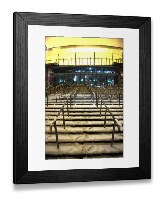 Framed Print : Winter's Reign at Emirates: Arsenal vs. Blackburn Rovers Amidst a Blanket of Snow