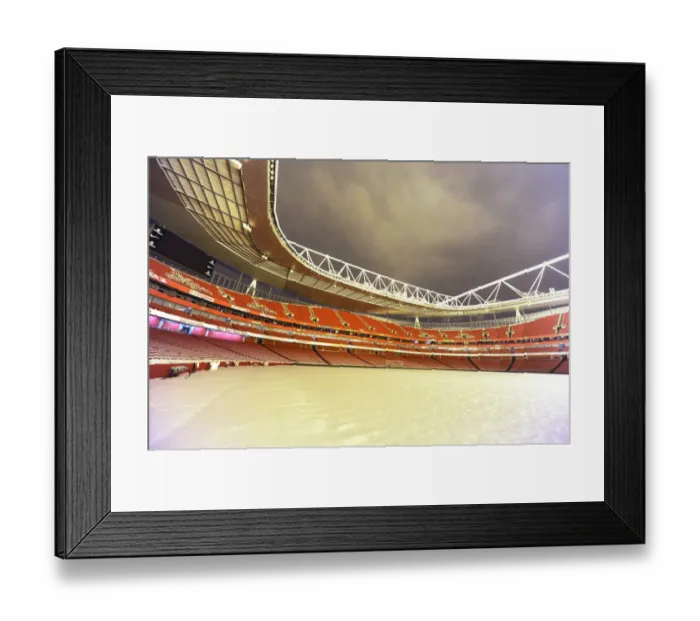 Framed Print : Winter's Grip: Arsenal's Emirates Stadium Blanketed in Snow during Premier League Match Framed Print : Winter's Grip: Arsenal's Emirates Stadium Blanketed in Snow during Premier League Match