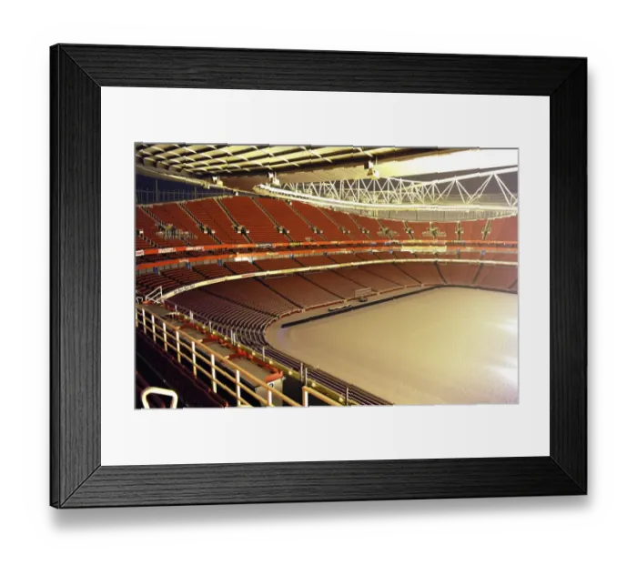 Framed Print : Winter's Grip: Arsenal's Emirates Stadium Blanketed in Snow