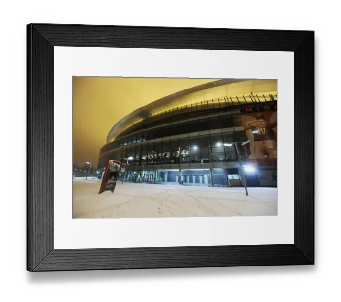 Framed Print : Winter's Grasp on Emirates Stadium: Arsenal's Battlefield in the Snowy Premier League Framed Print : Winter's Grasp on Emirates Stadium: Arsenal's Battlefield in the Snowy Premier League