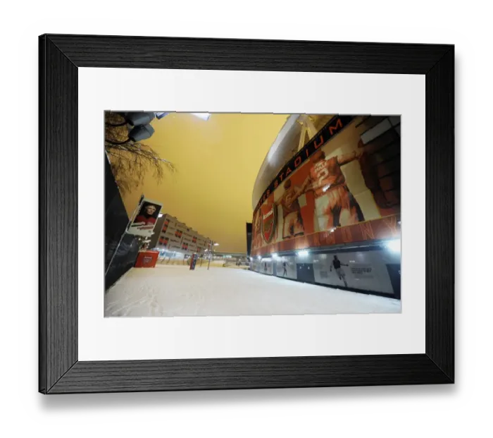 Framed Print : Winter's Embrace: Arsenal's Emirates Stadium Transformed by Snow